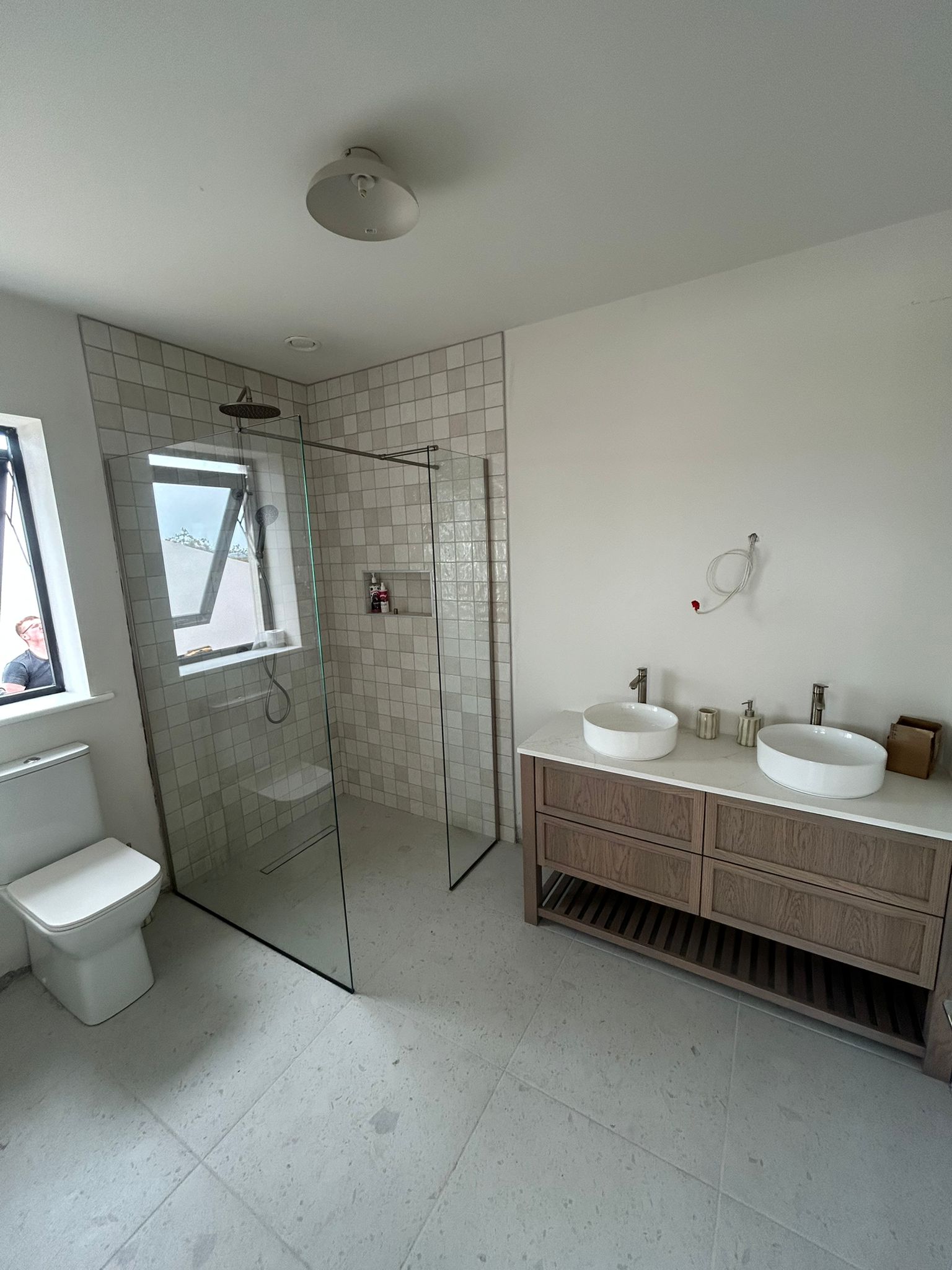 Completed bathroom sink and fittings installation